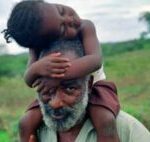 Pg11_David-with-girl-on-shoulders-300×142