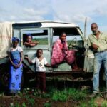 Pg11_Family-at-car-150×150